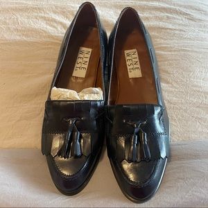 Black Nine West loafers.
